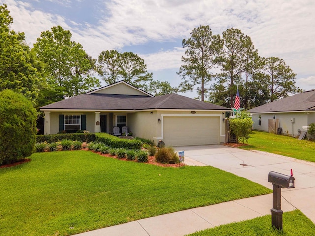 142 Patriot Ln, Elkton, FL 32033 - ranch-style house with a garage, concrete driveway, stucco siding, and a front yard