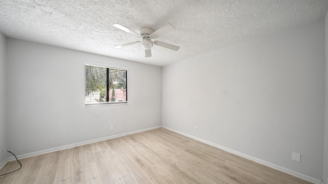 5811 Atlantic Blvd Unit 57, Jacksonville, FL 32207 - empty room featuring light wood-style flooring, ceiling fan, and a textured ceiling