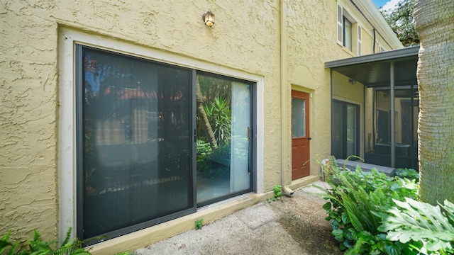 5811 Atlantic Blvd Unit 57, Jacksonville, FL 32207 - doorway to property featuring stucco siding