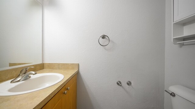5811 Atlantic Blvd Unit 57, Jacksonville, FL 32207 - half bathroom featuring vanity and toilet