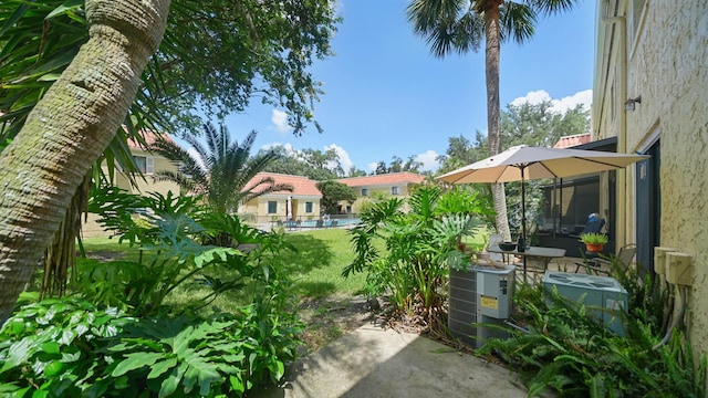 5811 Atlantic Blvd Unit 57, Jacksonville, FL 32207 - view of yard with a patio and a community pool