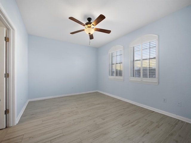 2200 Vista Cove Rd, Saint Augustine, FL 32084 - unfurnished room featuring ceiling fan, baseboards, and light wood-style floors