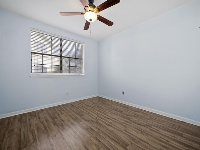 2200 Vista Cove Rd, Saint Augustine, FL 32084 - spare room with a ceiling fan, dark wood-style flooring, and baseboards
