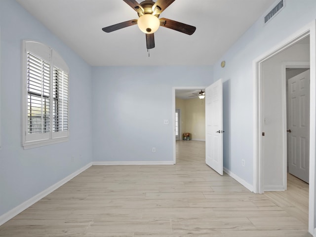 2200 Vista Cove Rd, Saint Augustine, FL 32084 - unfurnished room featuring light wood finished floors, baseboards, a ceiling fan, and visible vents
