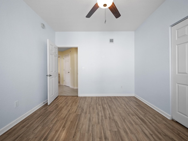 2200 Vista Cove Rd, Saint Augustine, FL 32084 - unfurnished room featuring baseboards, visible vents, ceiling fan, and wood finished floors