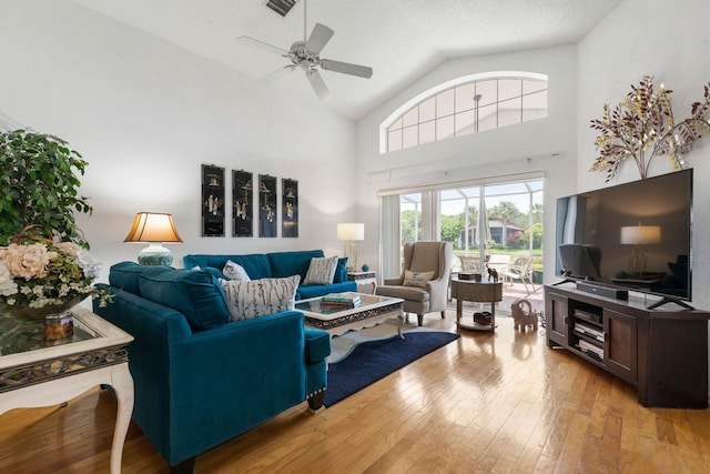 19 San Rafael Ct, Palm Coast, FL 32137 - living area featuring light wood-type flooring, a ceiling fan, and high vaulted ceiling
