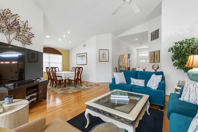19 San Rafael Ct, Palm Coast, FL 32137 - living room featuring light wood-style flooring, ceiling fan, recessed lighting, and high vaulted ceiling