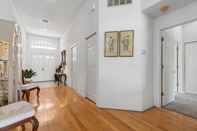 19 San Rafael Ct, Palm Coast, FL 32137 - entryway with light wood-type flooring and baseboards