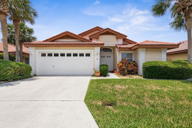 19 San Rafael Ct, Palm Coast, FL 32137 - mediterranean / spanish-style house featuring an attached garage, concrete driveway, stucco siding, a front yard, and a tile roof