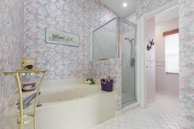 19 San Rafael Ct, Palm Coast, FL 32137 - full bathroom featuring tile patterned floors, a whirlpool tub, a shower stall, and wallpapered walls