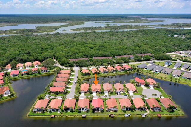 19 San Rafael Ct, Palm Coast, FL 32137 - aerial view of residential area featuring a nearby body of water and a forest