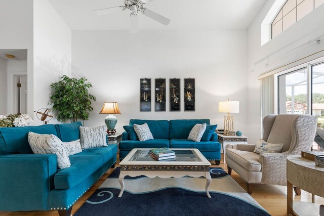 19 San Rafael Ct, Palm Coast, FL 32137 - living room with plenty of natural light, wood finished floors, and ceiling fan
