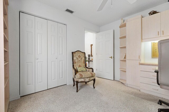 19 San Rafael Ct, Palm Coast, FL 32137 - sitting room with ceiling fan and carpet