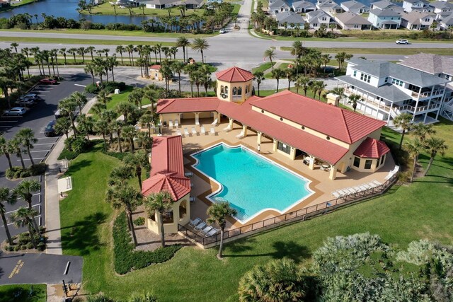 19 San Rafael Ct, Palm Coast, FL 32137 - aerial perspective of suburban area with a pool area and a large body of water