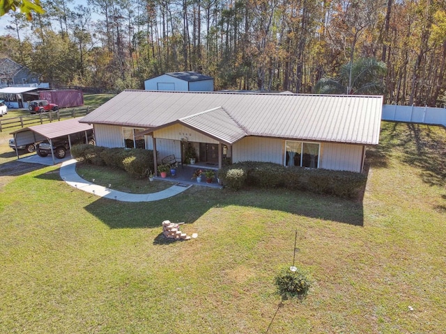 ranch-style home with a front lawn