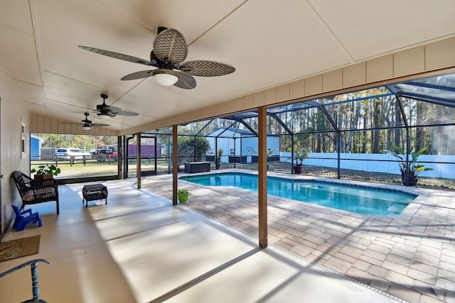 view of swimming pool with ceiling fan