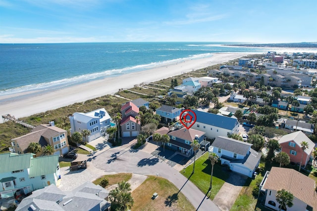 aerial view featuring a water view and a view of the beach