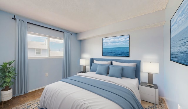 7175 A1A S # F238 # F238, Saint Augustine, FL 32080 - bedroom with carpet flooring, a textured ceiling, and baseboards
