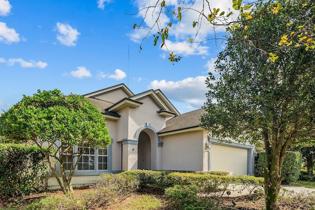 view of front of home with a garage