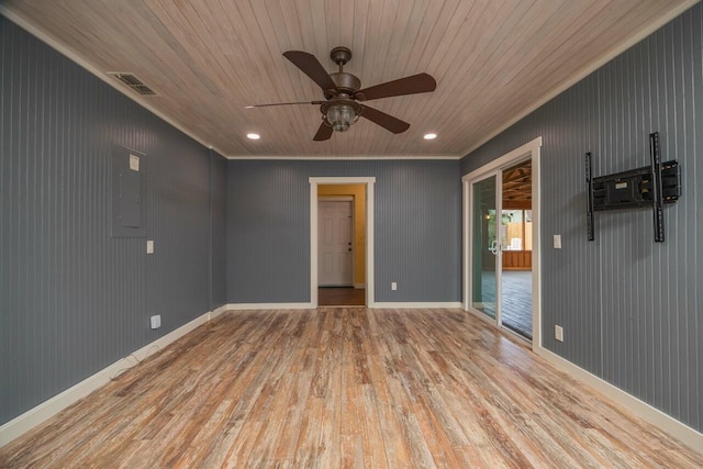 empty room featuring ceiling fan, wood walls, light wood-type flooring, and wooden ceiling