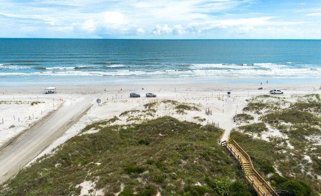 property view of water featuring a beach view