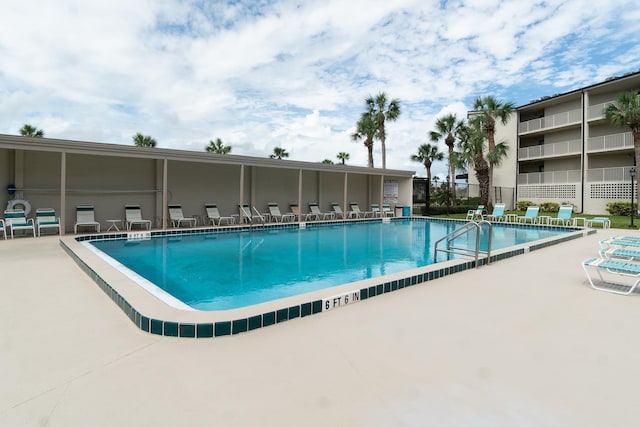 view of pool featuring a patio area