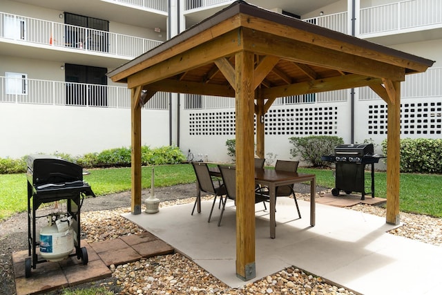 view of patio / terrace featuring a gazebo and grilling area