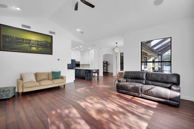 545 Sebastian Sq, Saint Augustine, FL 32095 - living area with arched walkways, dark wood-type flooring, ceiling fan, recessed lighting, and high vaulted ceiling