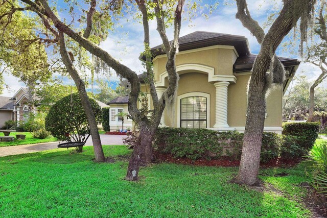 545 Sebastian Sq, Saint Augustine, FL 32095 - view of front of home with a front lawn and stucco siding