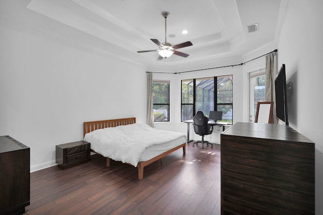 545 Sebastian Sq, Saint Augustine, FL 32095 - bedroom with crown molding, a raised ceiling, a desk, wood finished floors, and recessed lighting