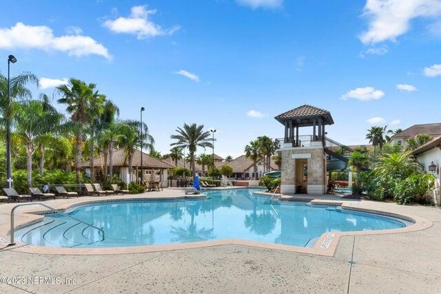545 Sebastian Sq, Saint Augustine, FL 32095 - community pool featuring a patio area