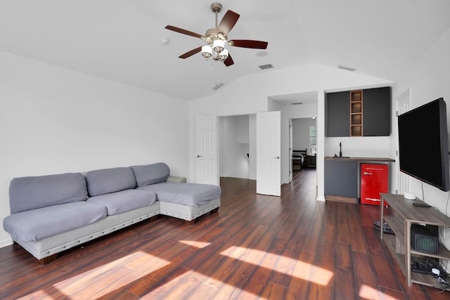 545 Sebastian Sq, Saint Augustine, FL 32095 - living room with vaulted ceiling, dark wood-style flooring, and a ceiling fan
