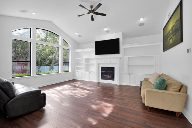 545 Sebastian Sq, Saint Augustine, FL 32095 - living area with ceiling fan, lofted ceiling, wood finished floors, baseboards, and built in features