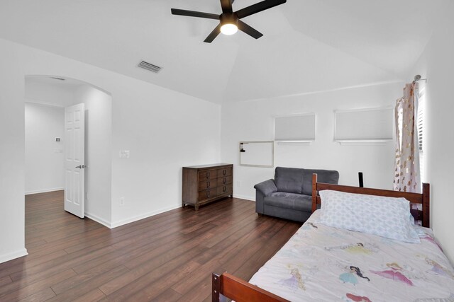 545 Sebastian Sq, Saint Augustine, FL 32095 - bedroom with arched walkways, vaulted ceiling, dark wood-type flooring, baseboards, and a ceiling fan