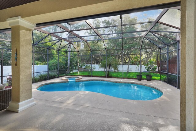 545 Sebastian Sq, Saint Augustine, FL 32095 - view of swimming pool featuring a patio, a fenced backyard, glass enclosure, and a pool with connected hot tub