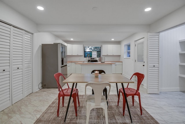 235 N Whitney St, Saint Augustine, FL 32084 - dining area featuring recessed lighting and light marble finish floors