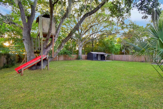 235 N Whitney St, Saint Augustine, FL 32084 - fenced backyard featuring a storage shed
