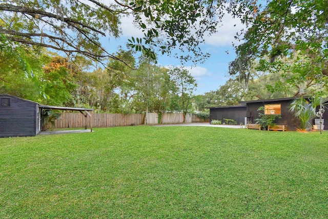 235 N Whitney St, Saint Augustine, FL 32084 - fenced backyard with an outbuilding
