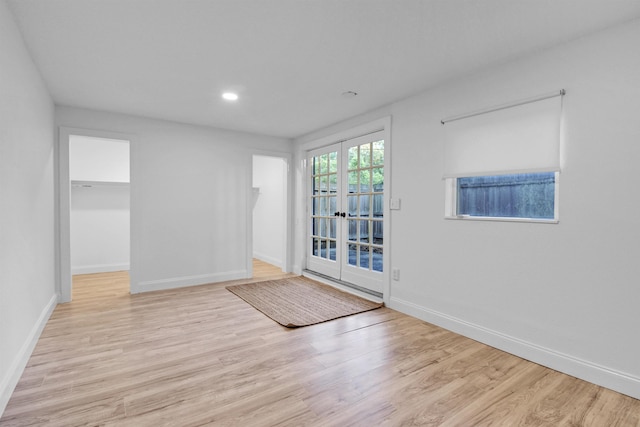 235 N Whitney St, Saint Augustine, FL 32084 - empty room with wood finished floors and recessed lighting