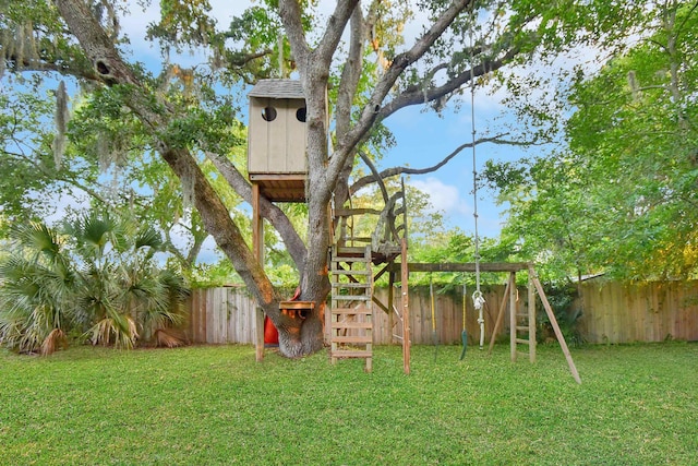 235 N Whitney St, Saint Augustine, FL 32084 - fenced backyard with a playground