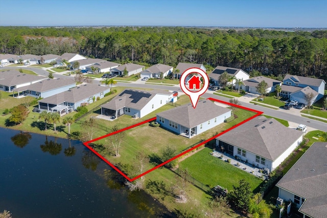 birds eye view of property featuring a water view