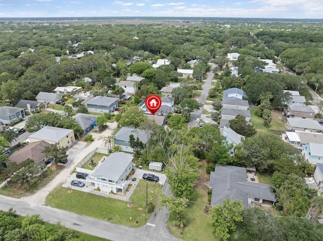 aerial view of property and surrounding area with nearby suburban area
