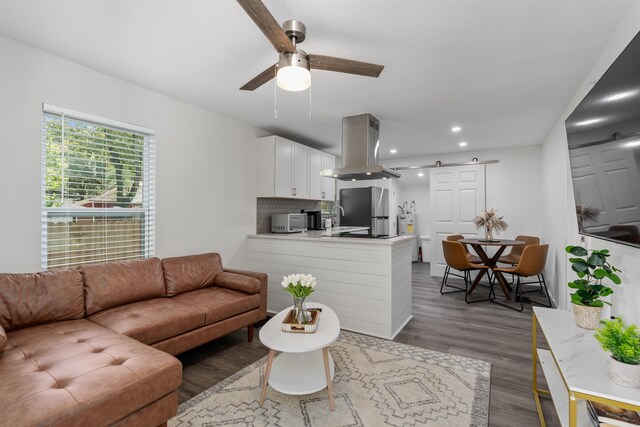 19 Phillips St, Saint Augustine, FL 32084 - living area featuring ceiling fan, recessed lighting, a barn door, and dark wood-style flooring