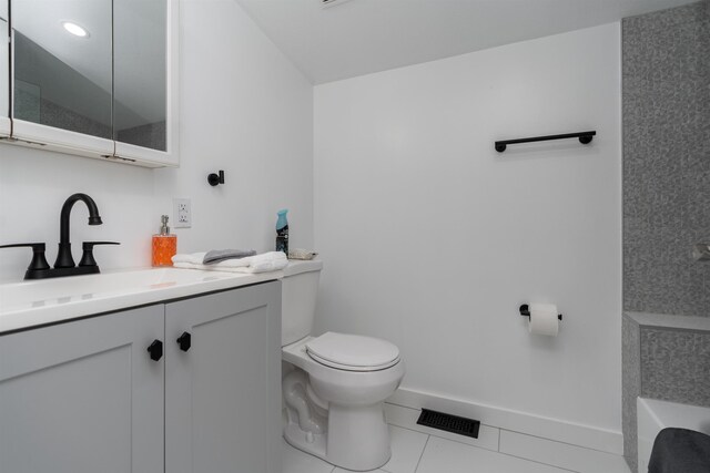 19 Phillips St, Saint Augustine, FL 32084 - full bath with vanity, baseboards, tile patterned flooring, toilet, and visible vents