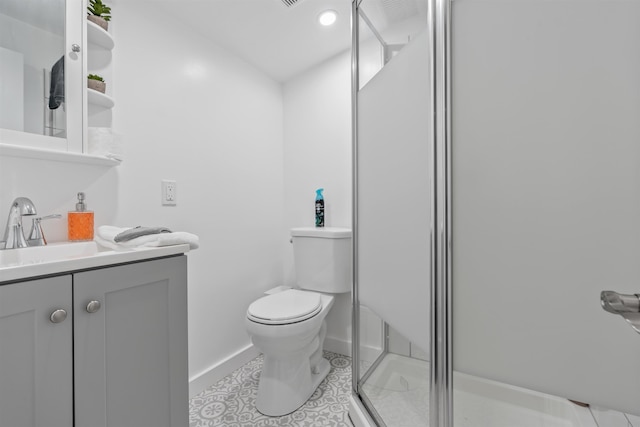 19 Phillips St, Saint Augustine, FL 32084 - bathroom with vanity, baseboards, tile patterned flooring, toilet, and a shower stall