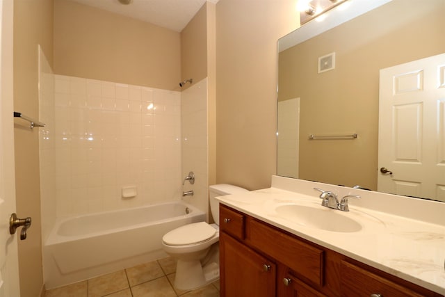 full bathroom featuring washtub / shower combination, tile patterned floors, vanity, and toilet