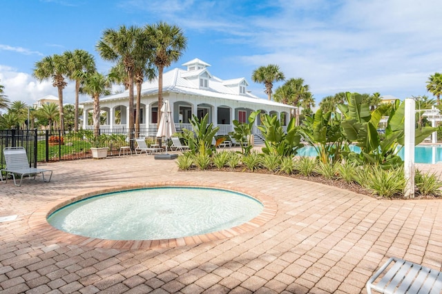 313 S Forest Dune Dr, Saint Augustine Beach, FL 32080 - community pool with a patio area