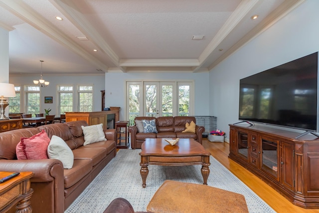 313 S Forest Dune Dr, Saint Augustine Beach, FL 32080 - living area featuring a chandelier, light wood finished floors, ornamental molding, and recessed lighting