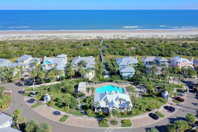 313 S Forest Dune Dr, Saint Augustine Beach, FL 32080 - aerial view of property and surrounding area featuring waterfront with a beach and nearby suburban area