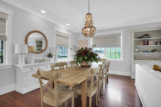 dining room featuring dark wood-style floors, baseboards, an inviting chandelier, recessed lighting, and crown molding